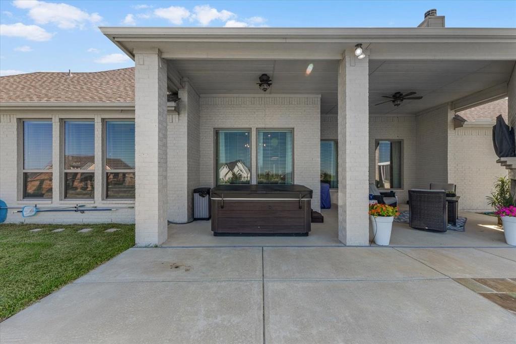 329 Palo Alto Drive Springtown, TX 76082 - Photo 28 of 34 Covered patio featuring a hot tub/ spa