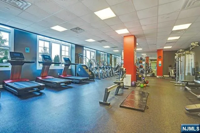 a room with furniture and wooden floor