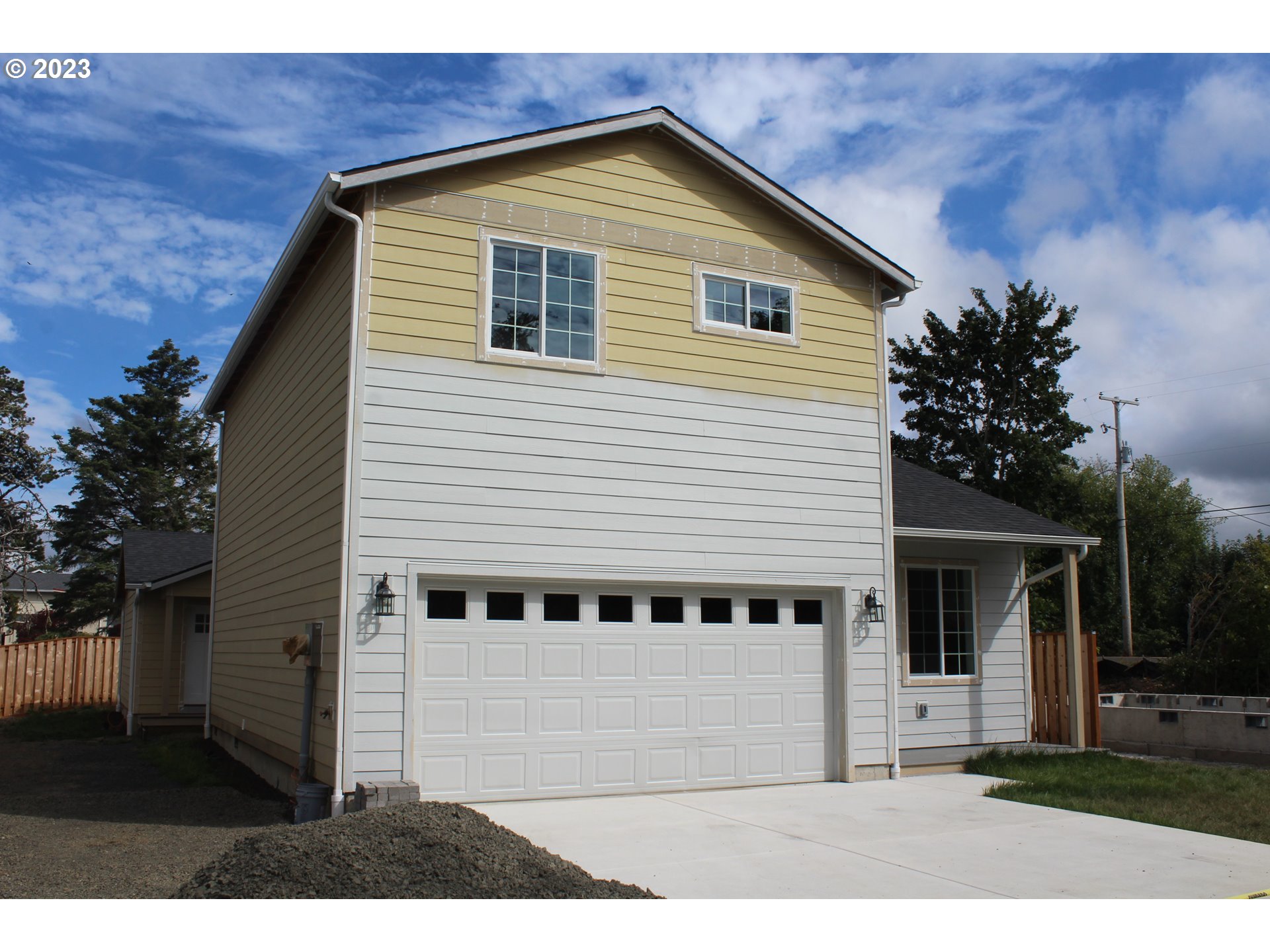 1384 10th Seaside, OR 97138 - Photo 2 of 36 a view of a house with a backyard