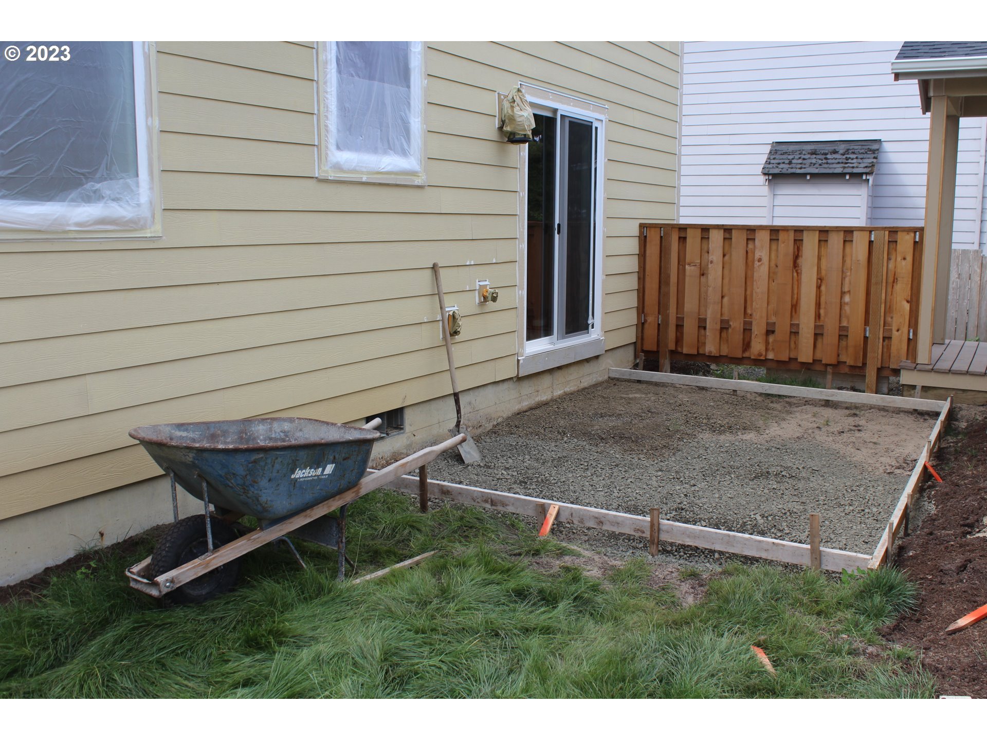 1384 10th Seaside, OR 97138 - Photo 25 of 36 a backyard of a house with wooden fence