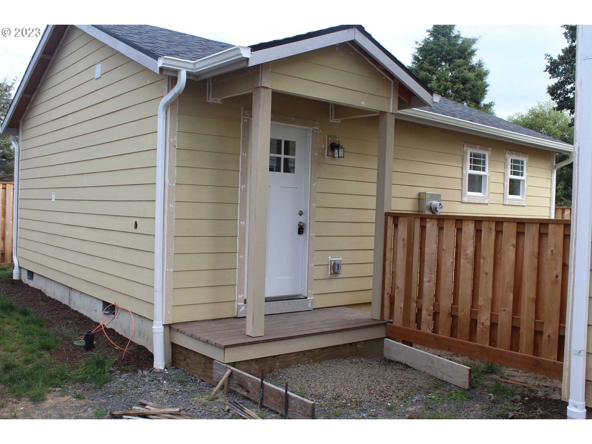 1384 10th Seaside, OR 97138 - Photo 27 of 36 a view of a house with wooden fence