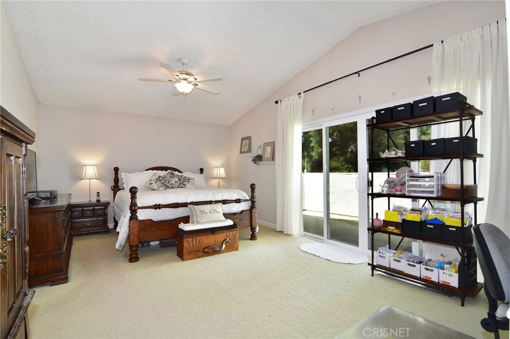 23628 Spires Street West Hills, CA 91304 - Photo 18 of 36 a living room with furniture and a dining table