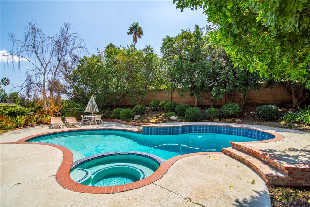 23628 Spires Street West Hills, CA 91304 - Photo 32 of 36 a view of swimming pool having outdoor seating