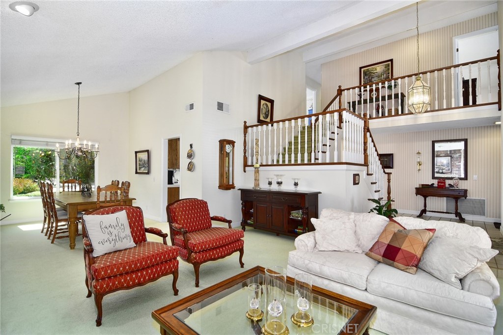 23628 Spires Street West Hills, CA 91304 - Photo 10 of 36 a living room with furniture fireplace and a window