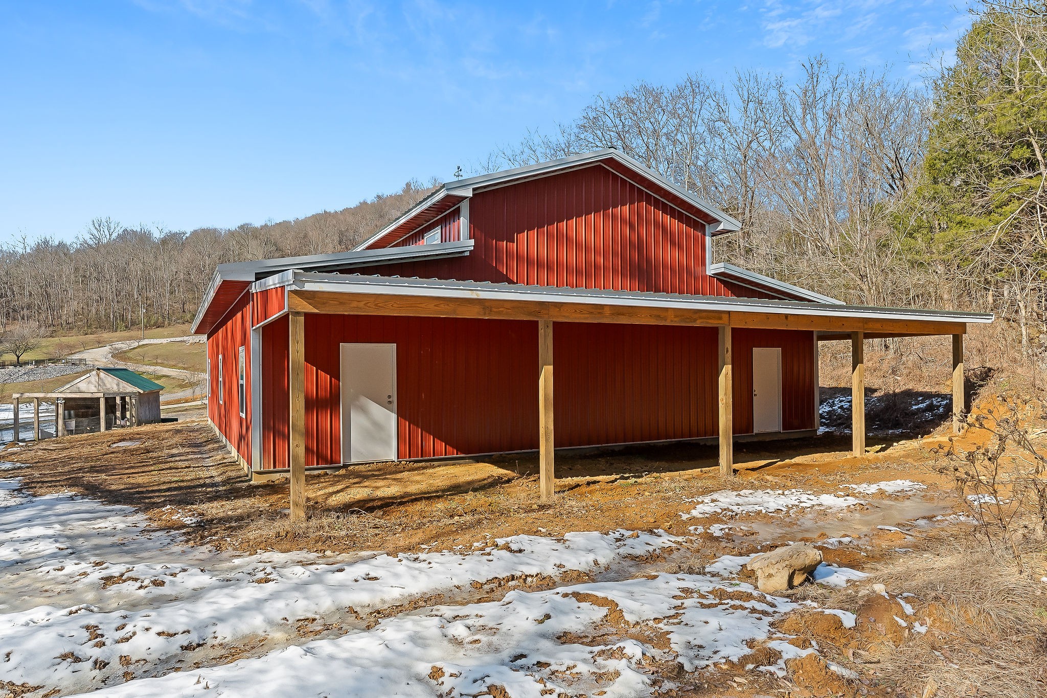 4830 Ensor Hollow Road Granville, TN 38564 - Photo 16 of 54 a view of a house with wooden fence