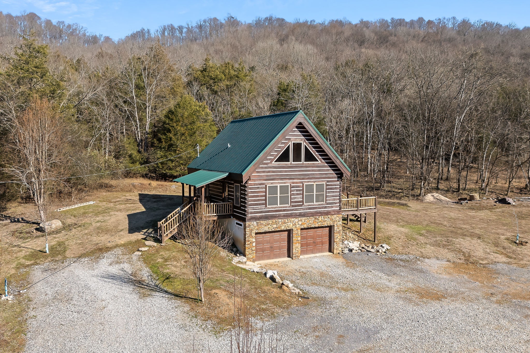 4830 Ensor Hollow Road Granville, TN 38564 - Photo 2 of 54 a view of a house with a yard