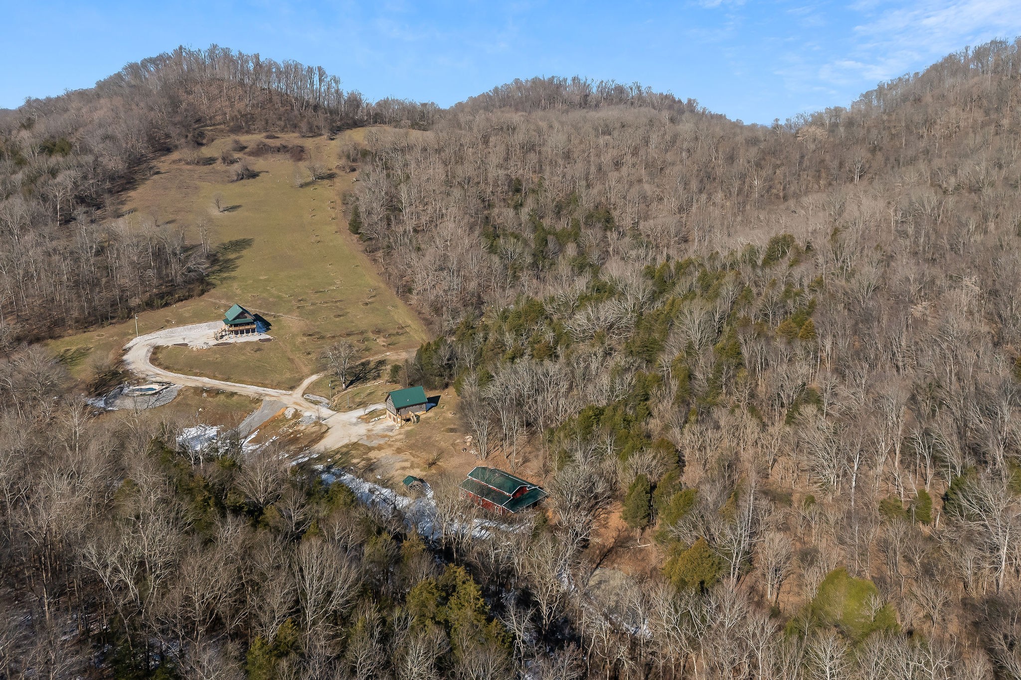 4830 Ensor Hollow Road Granville, TN 38564 - Photo 27 of 54 a view of a dry yard with mountains in the background