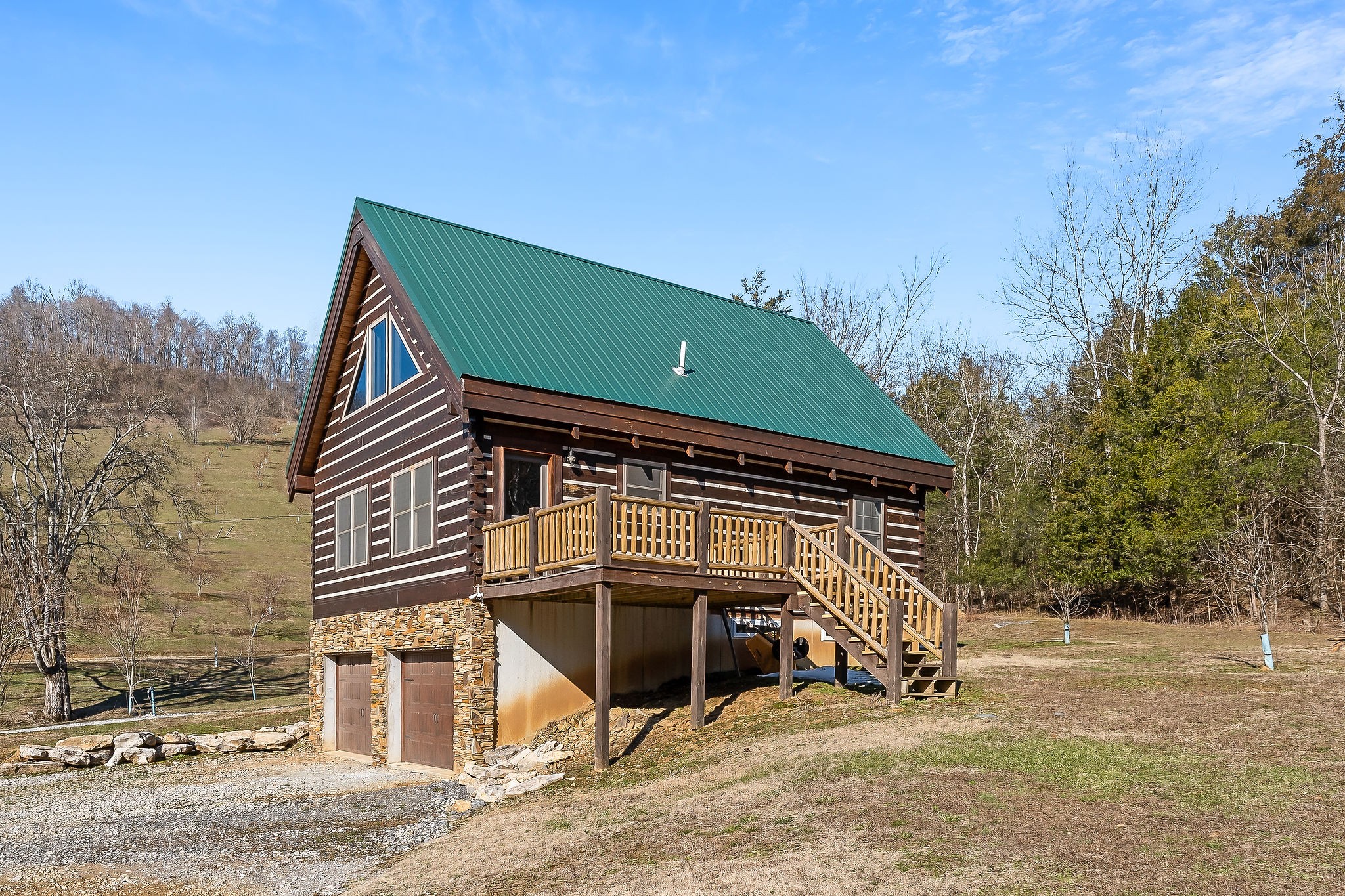 4830 Ensor Hollow Road Granville, TN 38564 - Photo 5 of 54 a view of a house with a yard