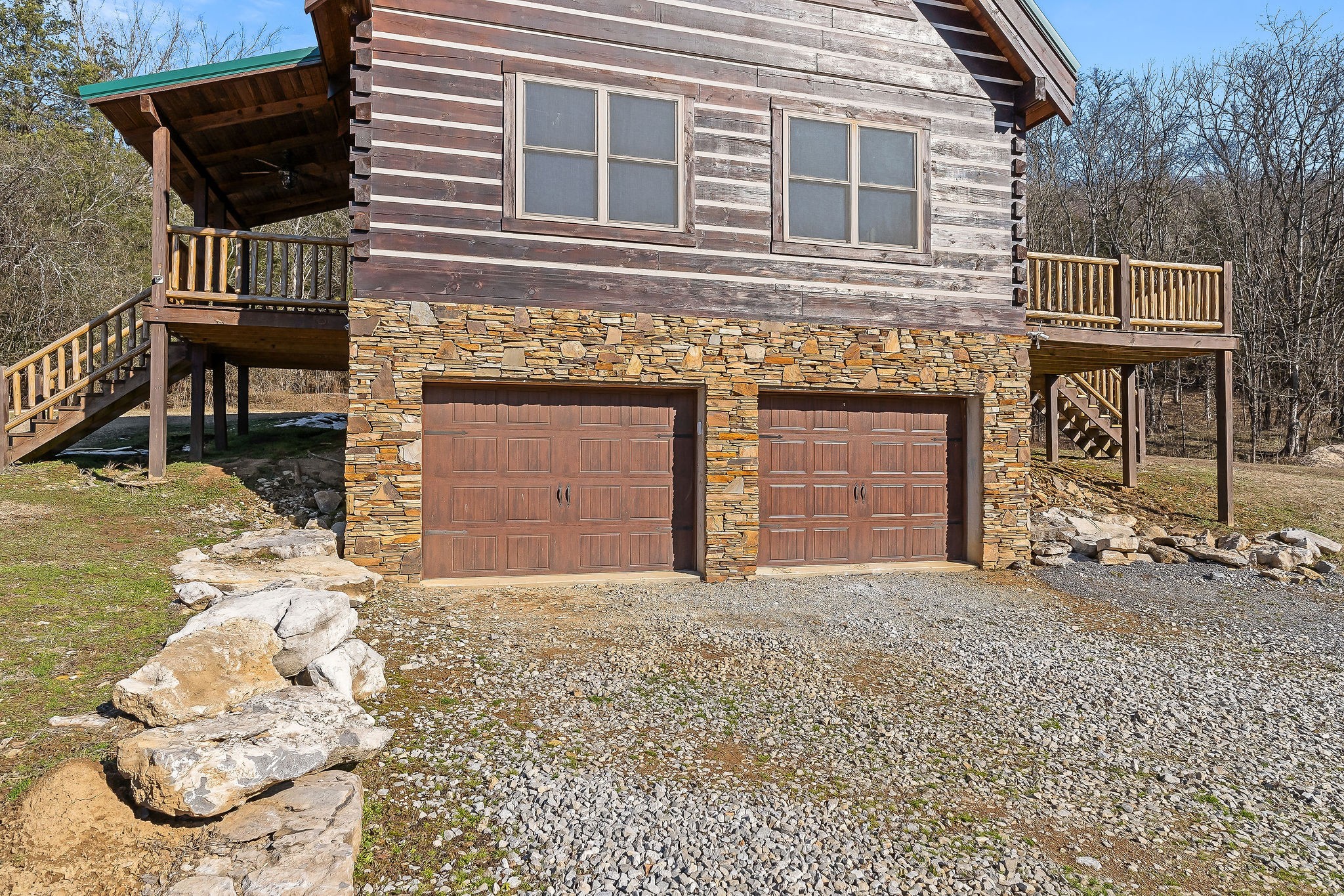 4830 Ensor Hollow Road Granville, TN 38564 - Photo 9 of 54 a front view of a house with a yard