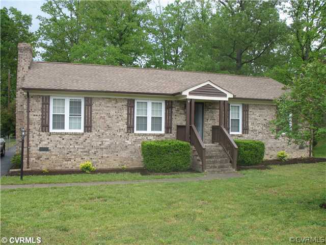 11612 Genito Road Midlothian, VA 23112 - Photo 1 of 12 a front view of a house with a yard