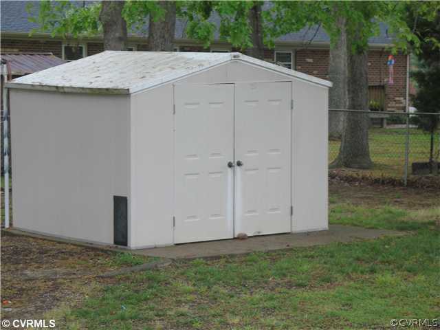 11612 Genito Road Midlothian, VA 23112 - Photo 3 of 12 a view of a backyard