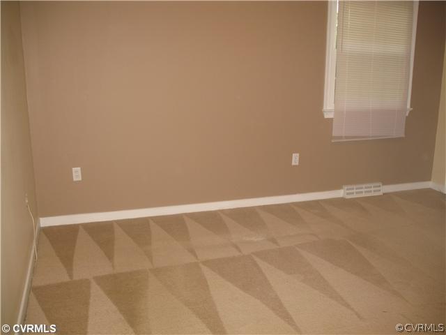 11612 Genito Road Midlothian, VA 23112 - Photo 10 of 12 a view of an empty room