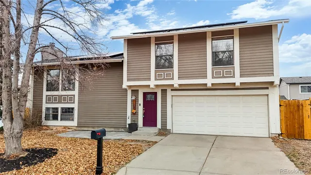 a front view of a house with garage