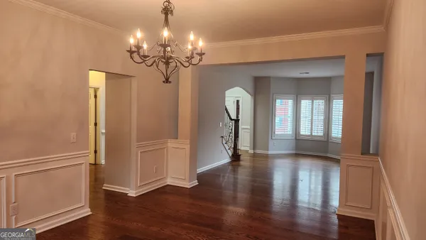 a view of a livingroom with wooden floor