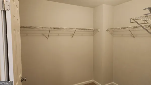a view of small space with racks on the wall