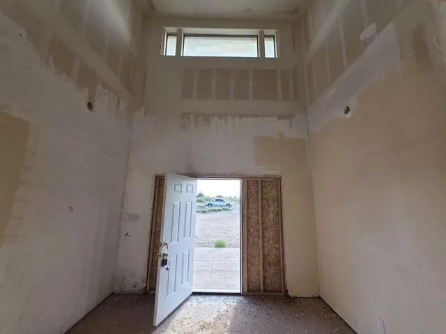 a view of an entryway and hallway