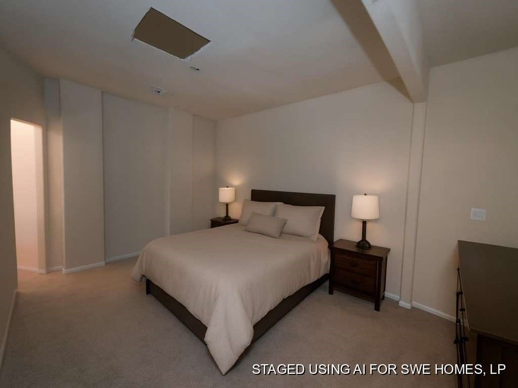 14026 Bradley Road El Paso, TX 79938 - Photo 8 of 12 a bedroom with a bed and a night stand