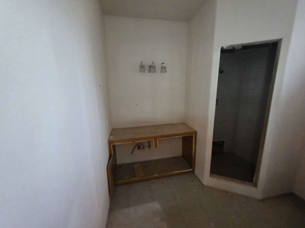 14026 Bradley Road El Paso, TX 79938 - Photo 10 of 12 a room with a door