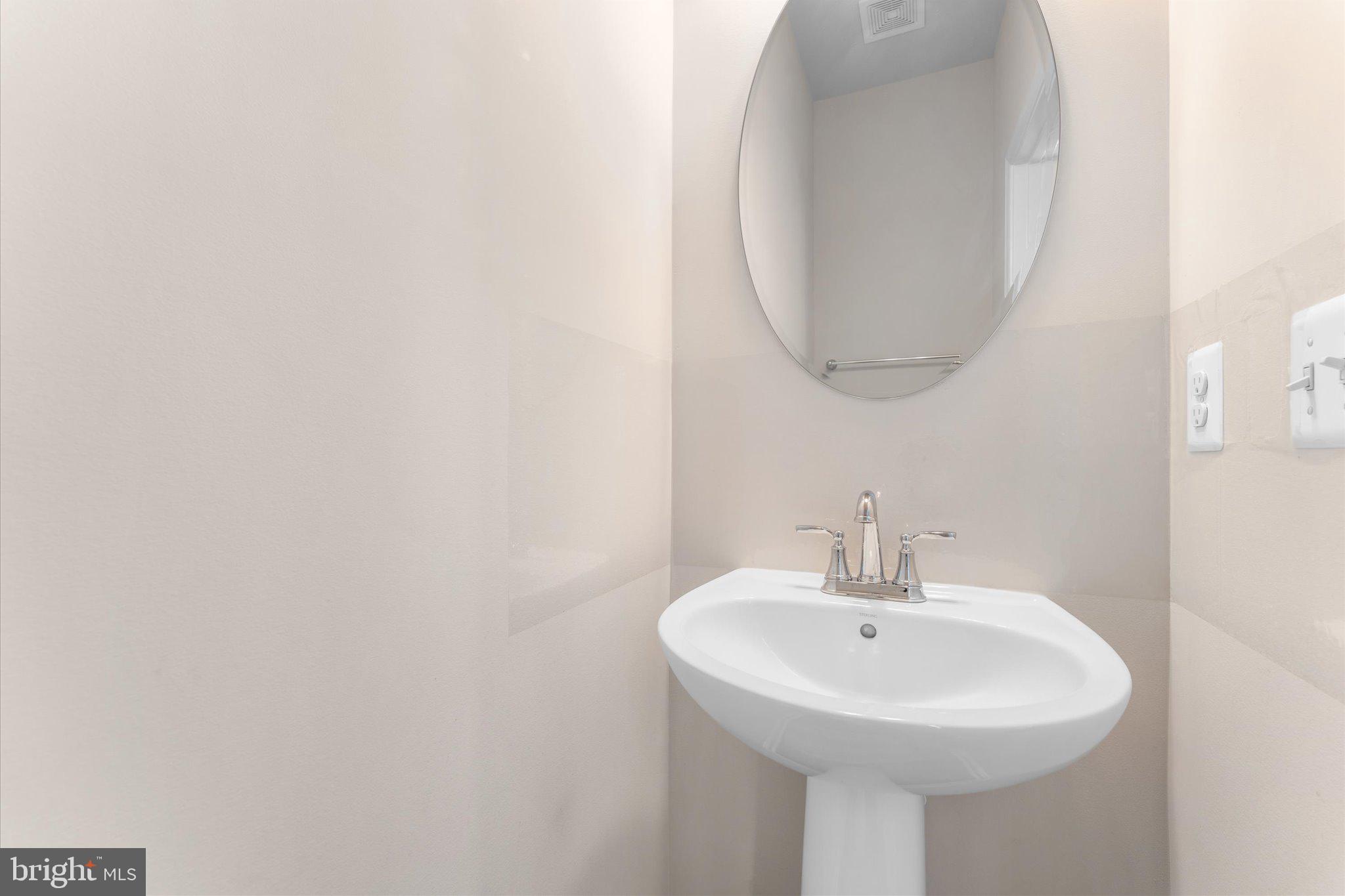 1776 Scenic Loop Culpeper, VA 22701 - Photo 15 of 36 a white sink sitting next to a white sink