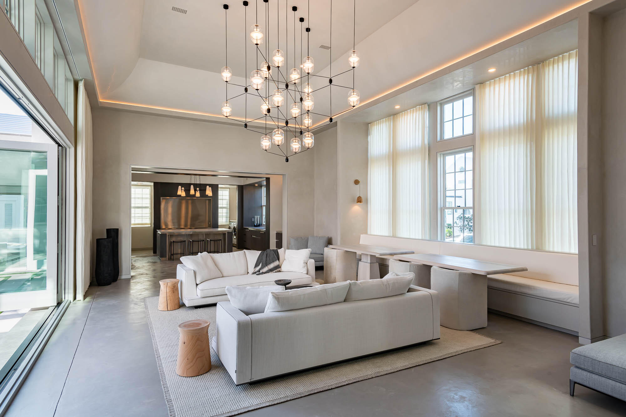 32 Mcgee Dr Inlet Beach Inlet Beach, FL 32461 - Photo 5 of 54 a living room with furniture and a chandelier