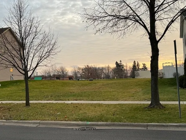 a view of a yard with an trees