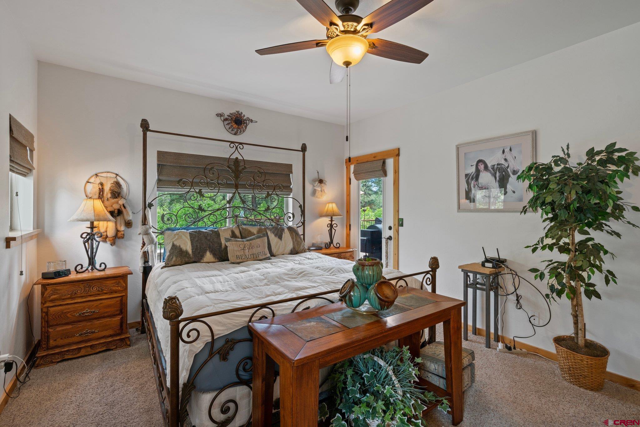 105 Window Lake Trail Durango, CO 81301 - Photo 18 of 36 a view of a dining room with furniture window and outside view