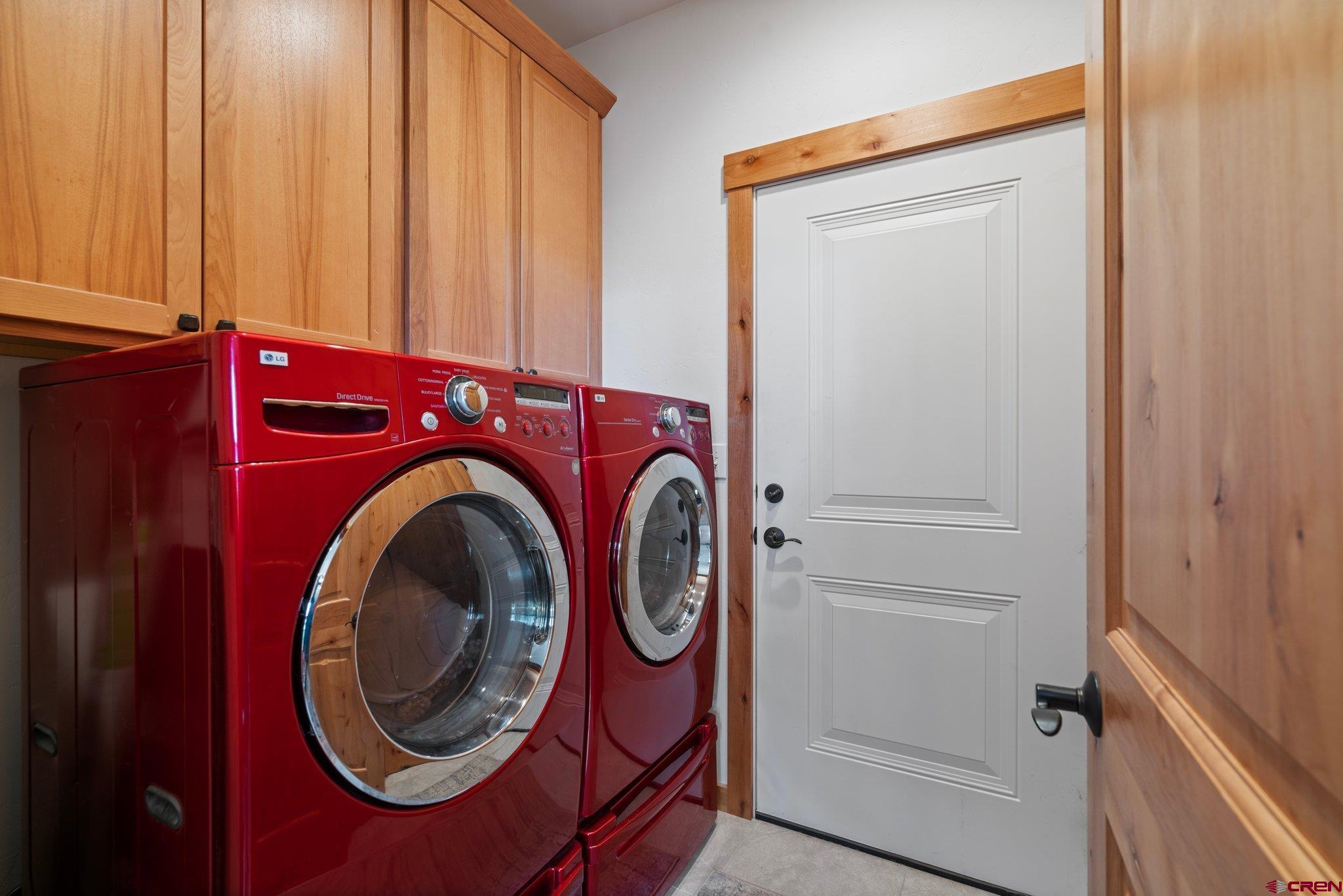 105 Window Lake Trail Durango, CO 81301 - Photo 22 of 36 a utility room with dryer and washer