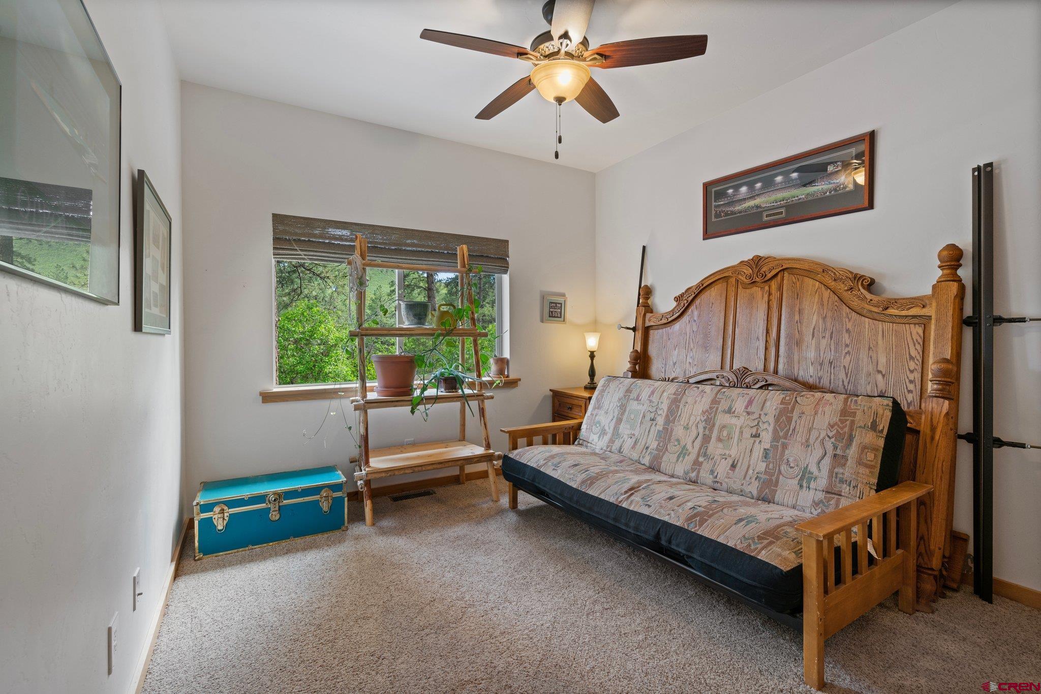 105 Window Lake Trail Durango, CO 81301 - Photo 26 of 36 a living room with furniture and a window