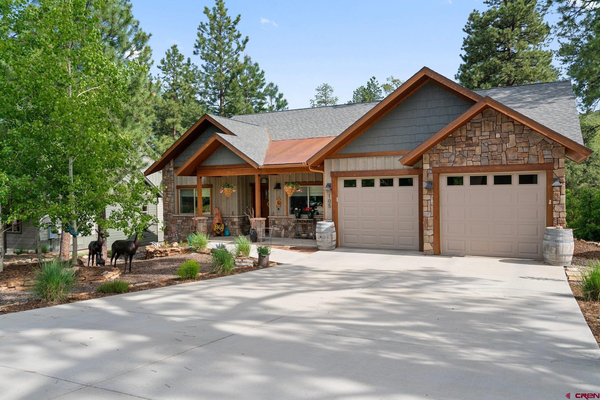 105 Window Lake Trail Durango, CO 81301 - Photo 33 of 36 a front view of a house with a yard
