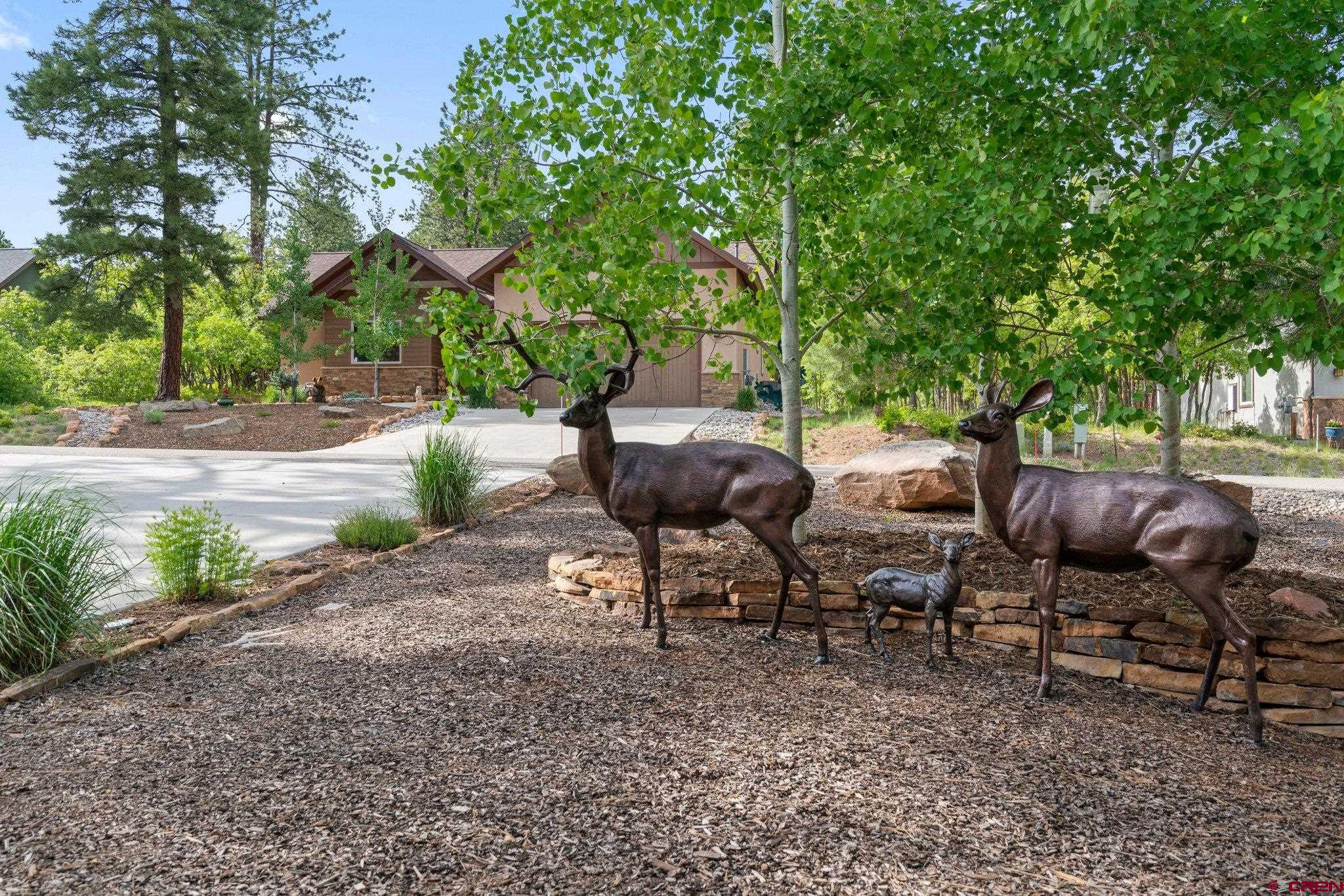 105 Window Lake Trail Durango, CO 81301 - Photo 34 of 36 a view of a chairs and table in backyard