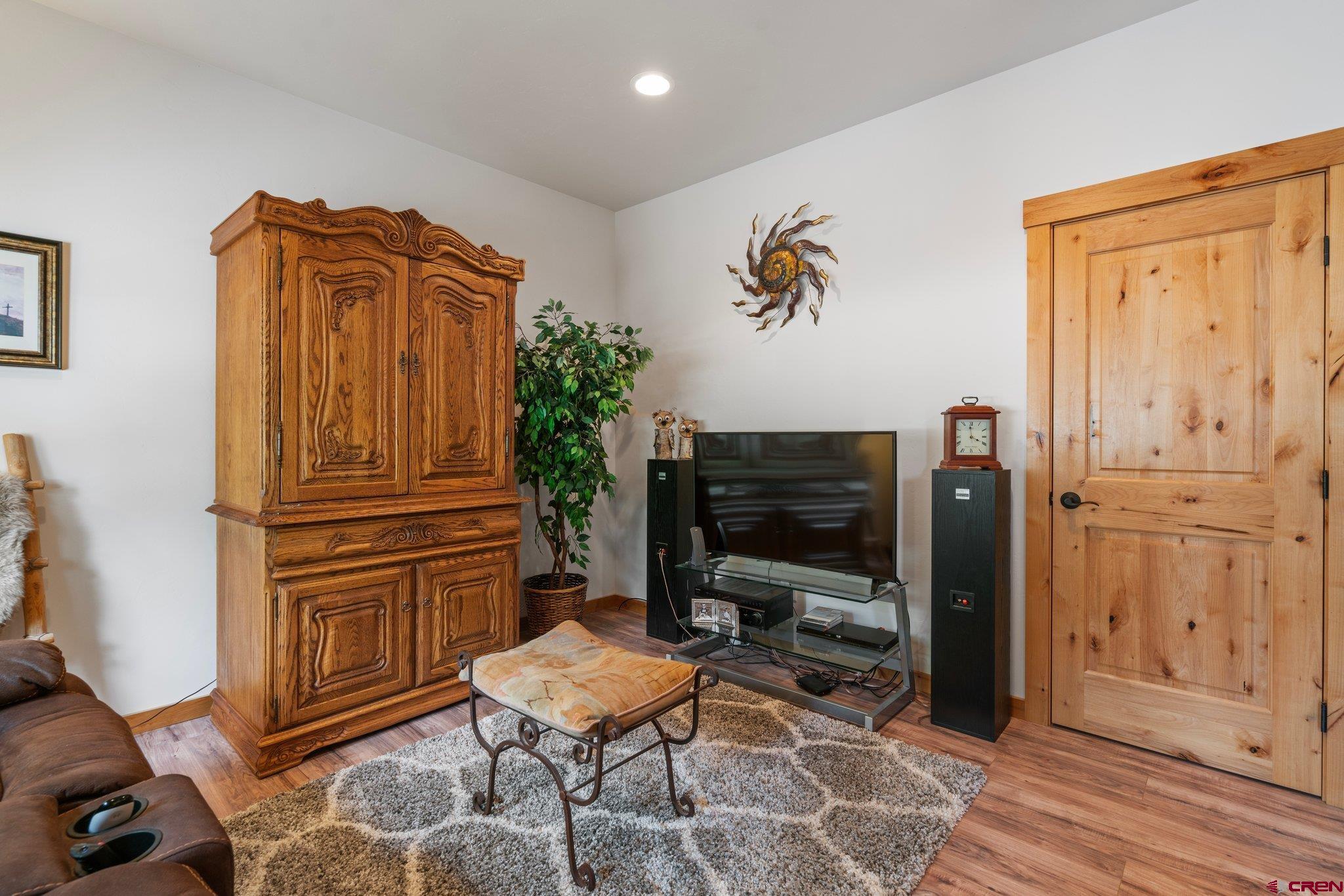 105 Window Lake Trail Durango, CO 81301 - Photo 4 of 36 a living room with furniture and a flat screen tv