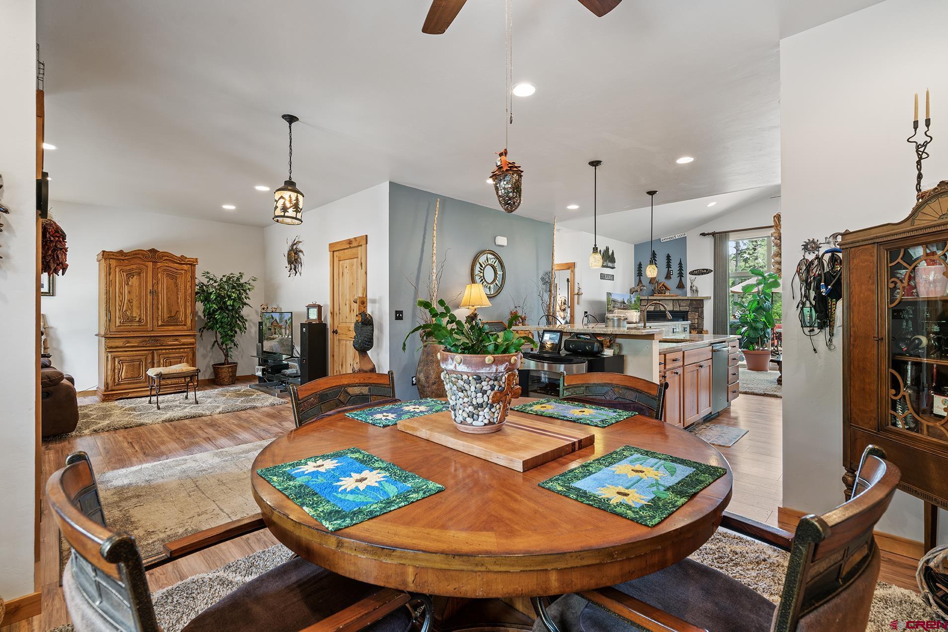 105 Window Lake Trail Durango, CO 81301 - Photo 7 of 36 a view of a dining room with furniture