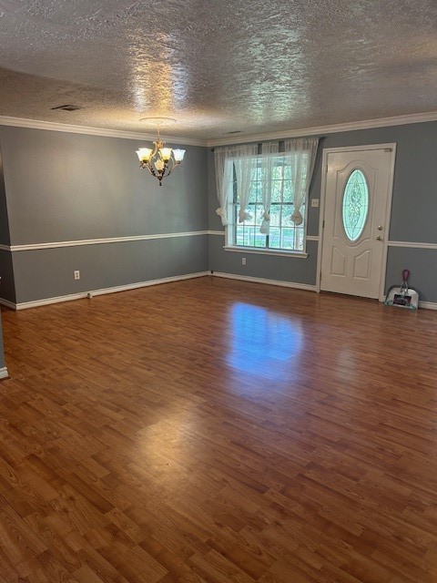 302 Arrowhead Drive Conroe, TX 77316 - Photo 19 of 23 an empty room with wooden floor and windows