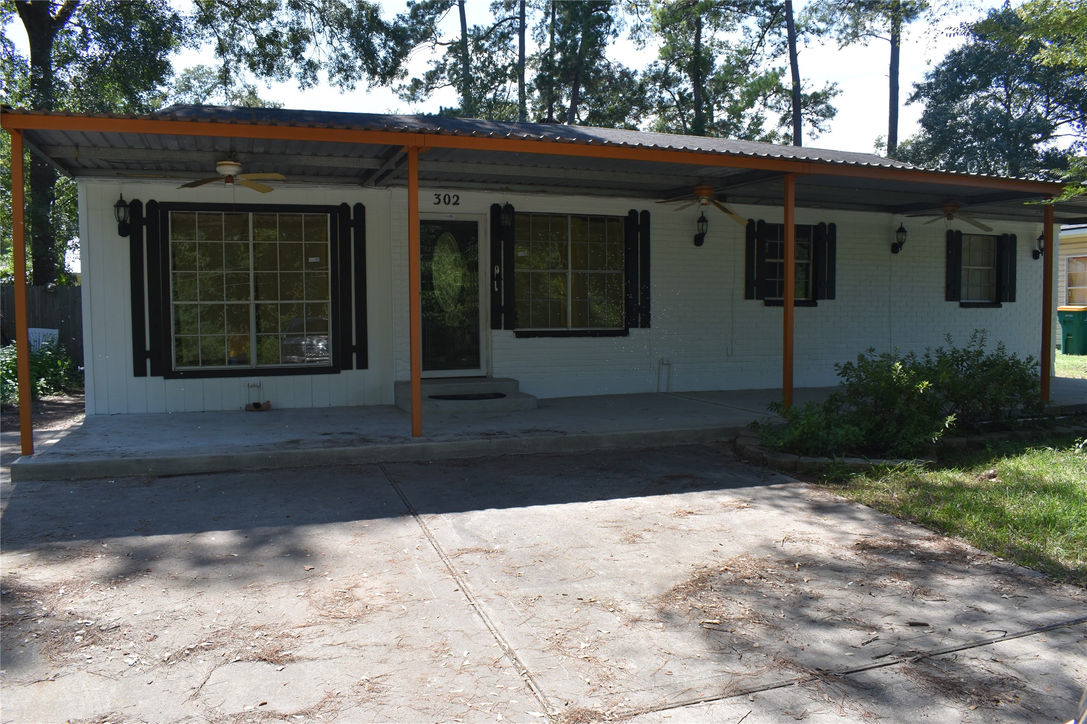 302 Arrowhead Drive Conroe, TX 77316 - Photo 2 of 23 a front view of a house