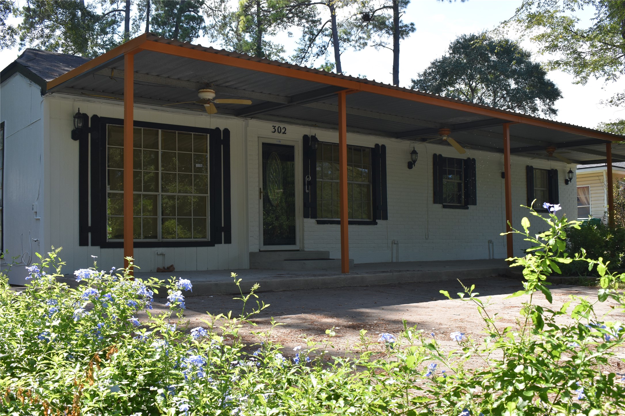 302 Arrowhead Drive Conroe, TX 77316 - Photo 3 of 23 a front view of a house