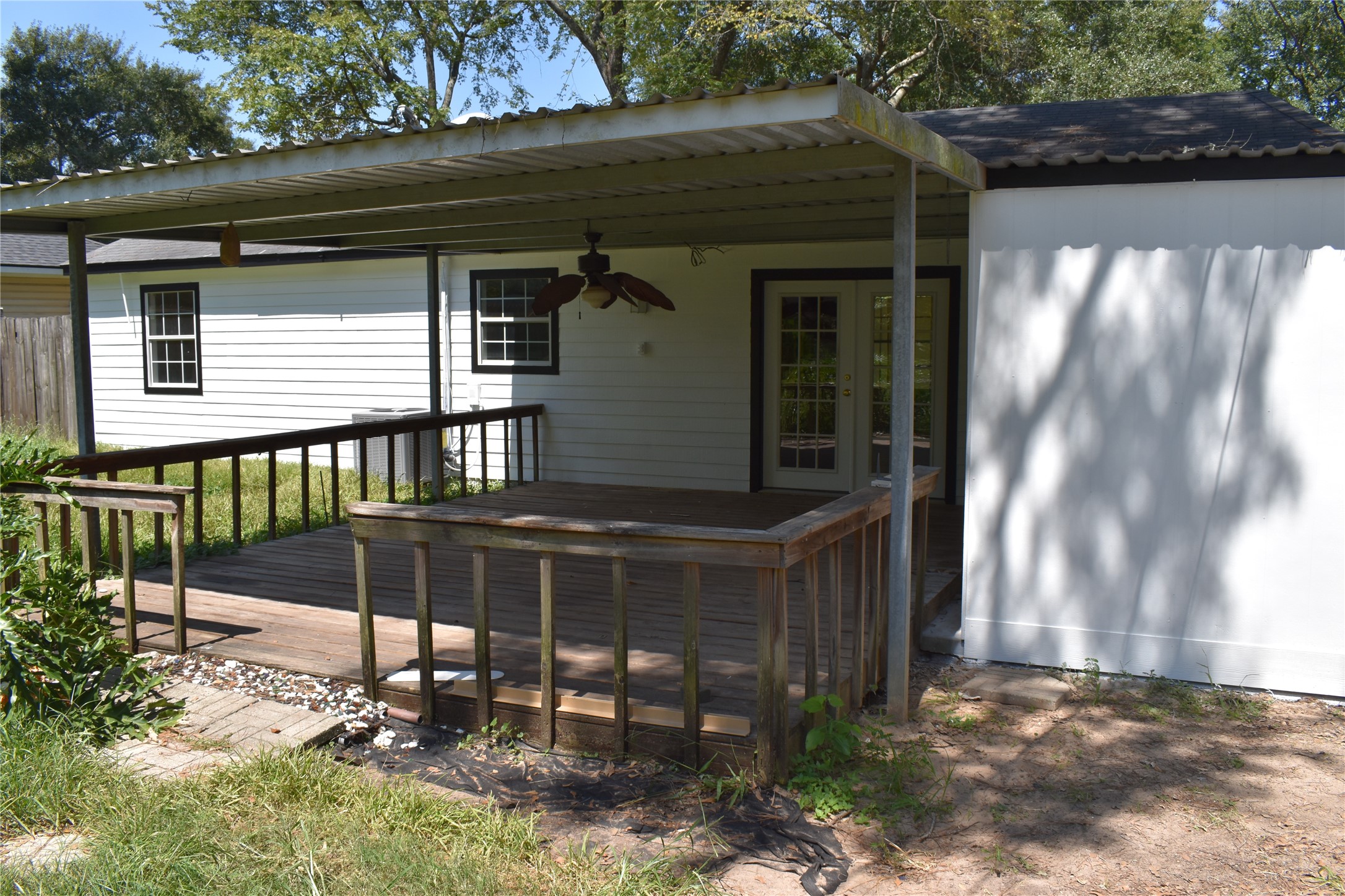 302 Arrowhead Drive Conroe, TX 77316 - Photo 7 of 23 a front view of a house with a yard