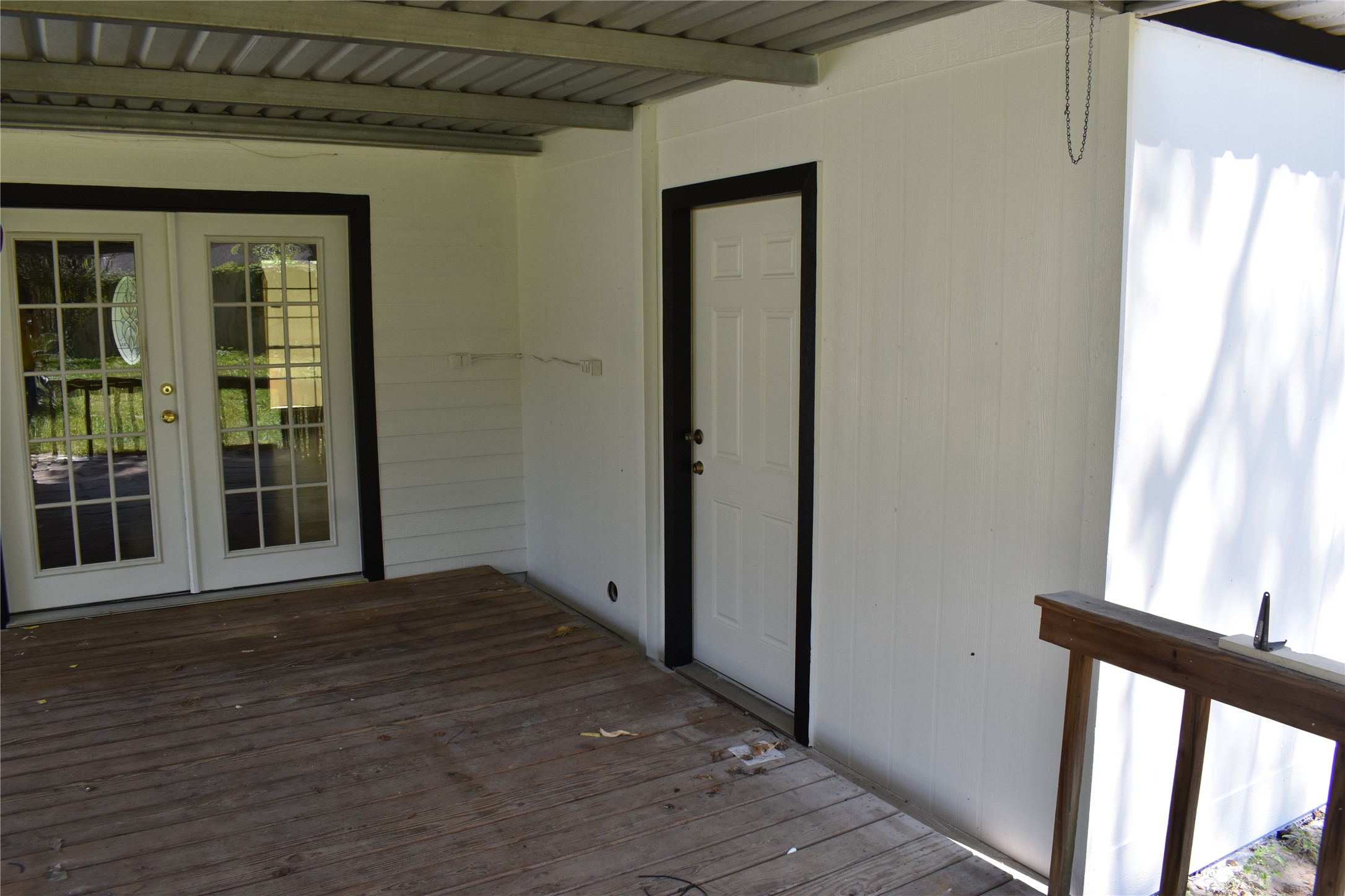 302 Arrowhead Drive Conroe, TX 77316 - Photo 8 of 23 a view of empty room with wooden floor and fan