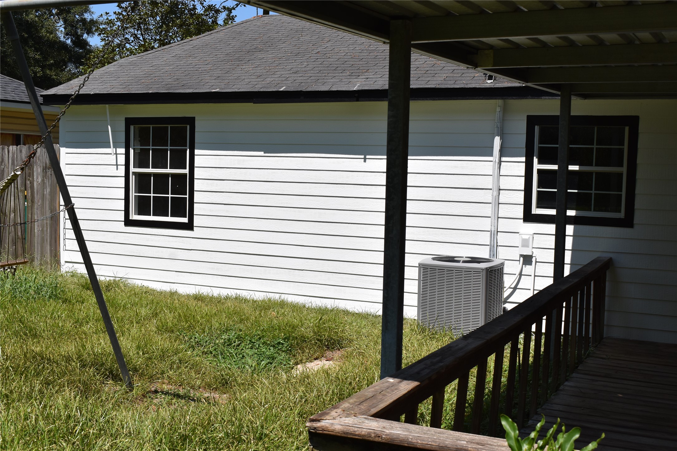 302 Arrowhead Drive Conroe, TX 77316 - Photo 9 of 23 a view of a balcony with chairs