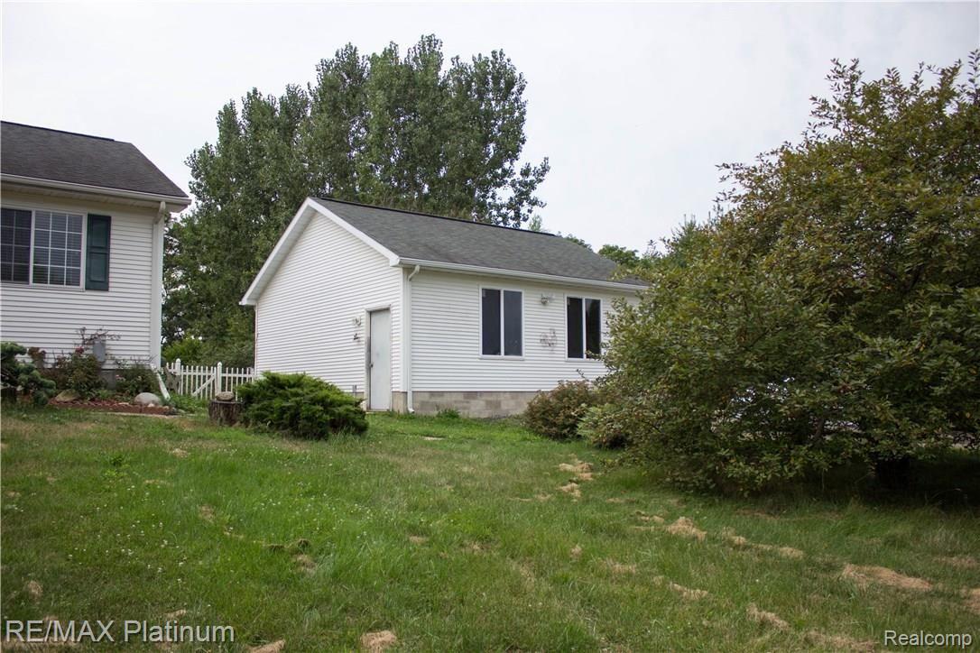 5761 Milett Road Fowlerville, MI 48836 - Photo 2 of 30 yard.jpg