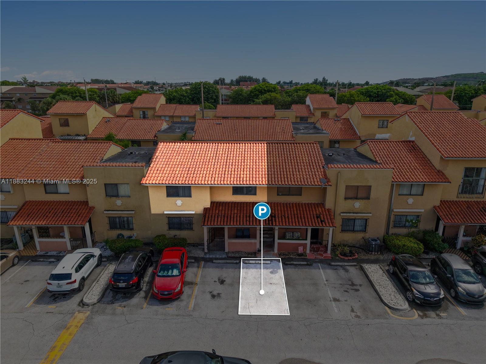2740 West 61st Street, Unit 204 Hialeah, FL 33016 - Photo 14 of 20 an aerial view of a houses with yard