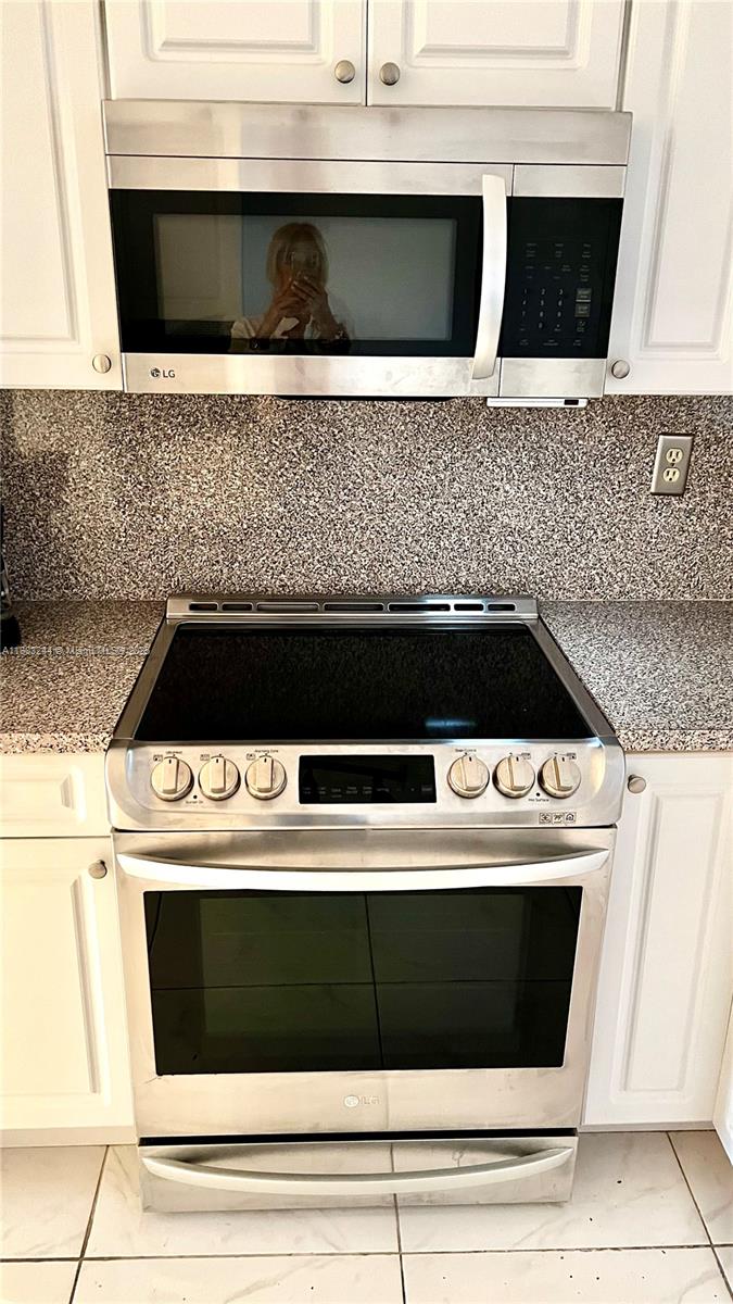 2740 West 61st Street, Unit 204 Hialeah, FL 33016 - Photo 15 of 20 a view of washer and dryer