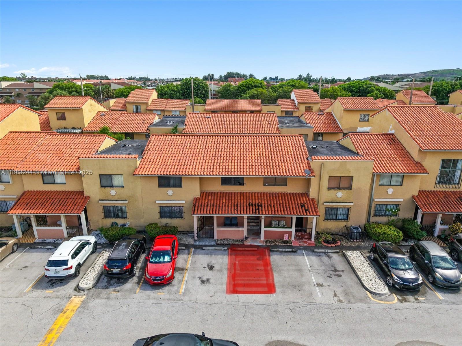 2740 West 61st Street, Unit 204 Hialeah, FL 33016 - Photo 2 of 20 an aerial view of residential houses