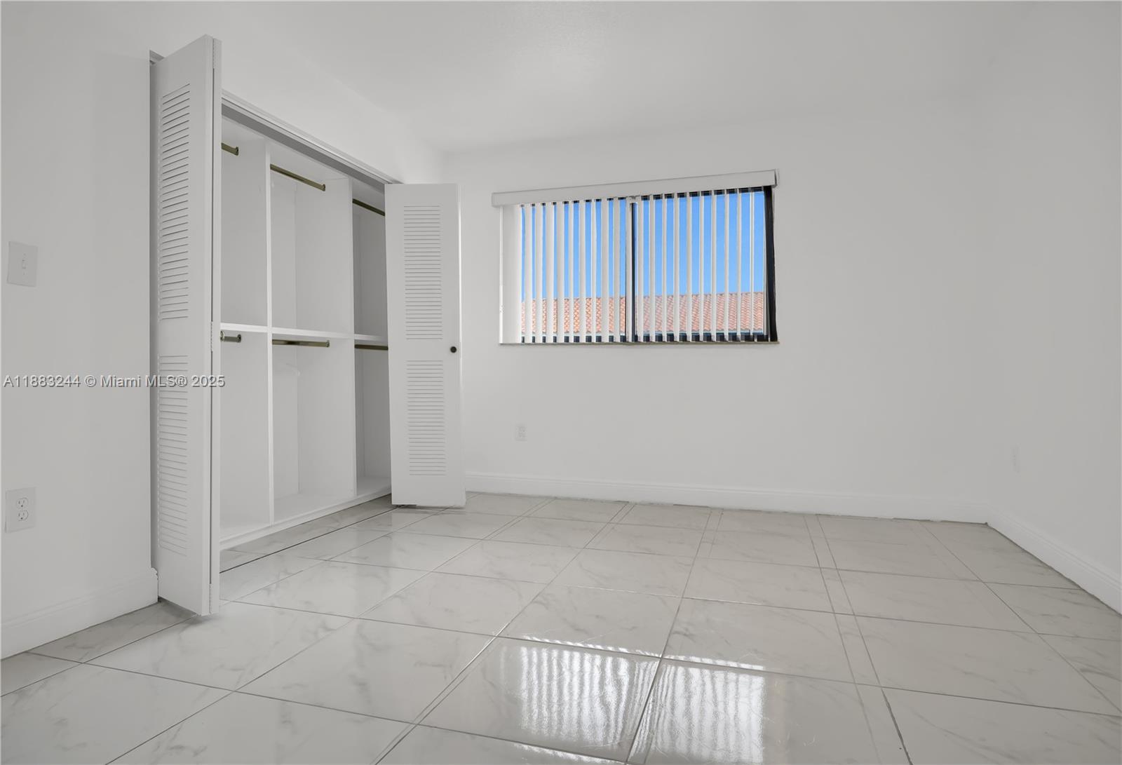 2740 West 61st Street, Unit 204 Hialeah, FL 33016 - Photo 5 of 20 a view of an empty room