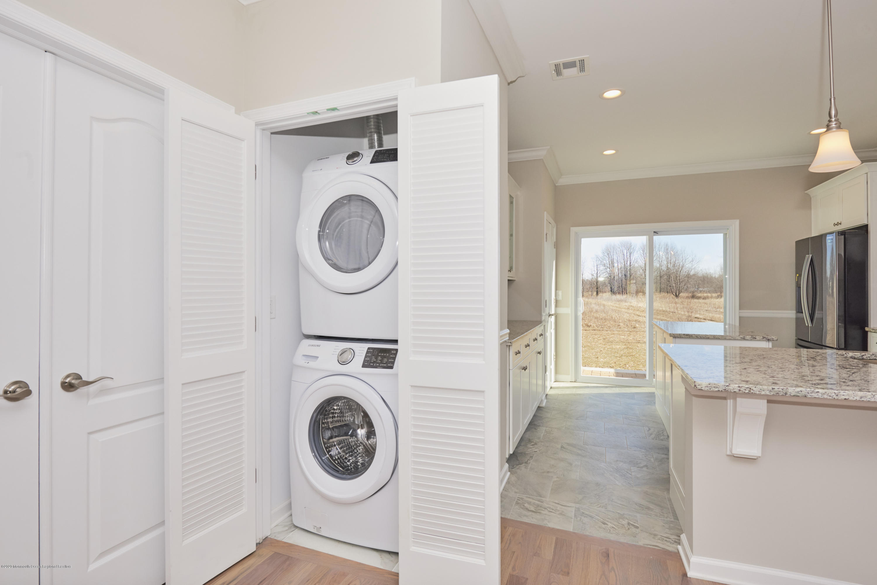 23 Green Tree Circle Hazlet, NJ 07730 - Photo 20 of 38 a view of kitchen with washer and dryer