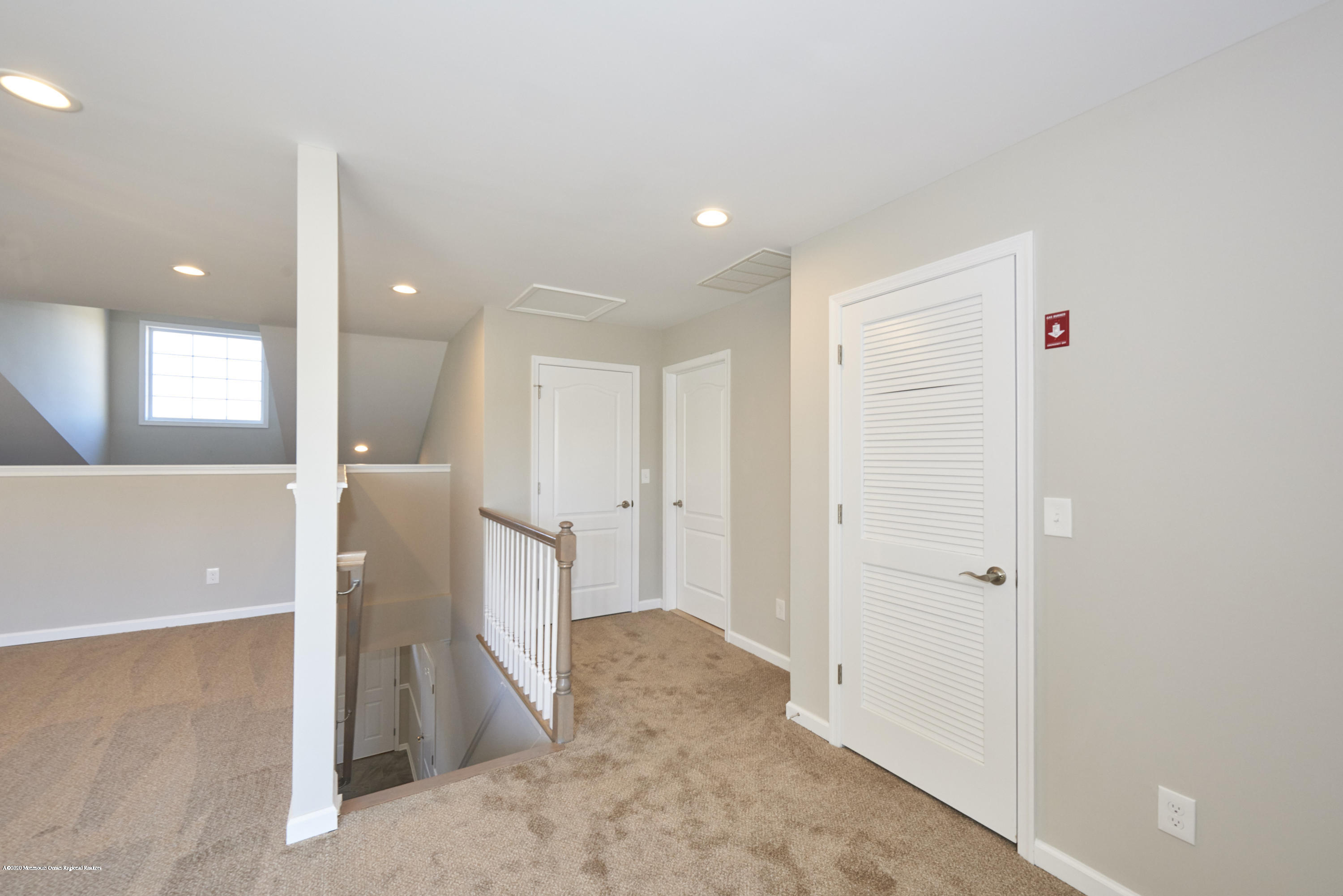 23 Green Tree Circle Hazlet, NJ 07730 - Photo 27 of 38 a view of a hallway with bathroom