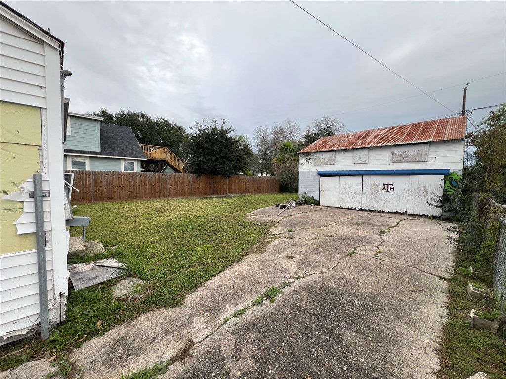 4402 Cottage Street Corpus Christi, TX 78415 - Photo 4 of 10 a view of a house with backyard and garden