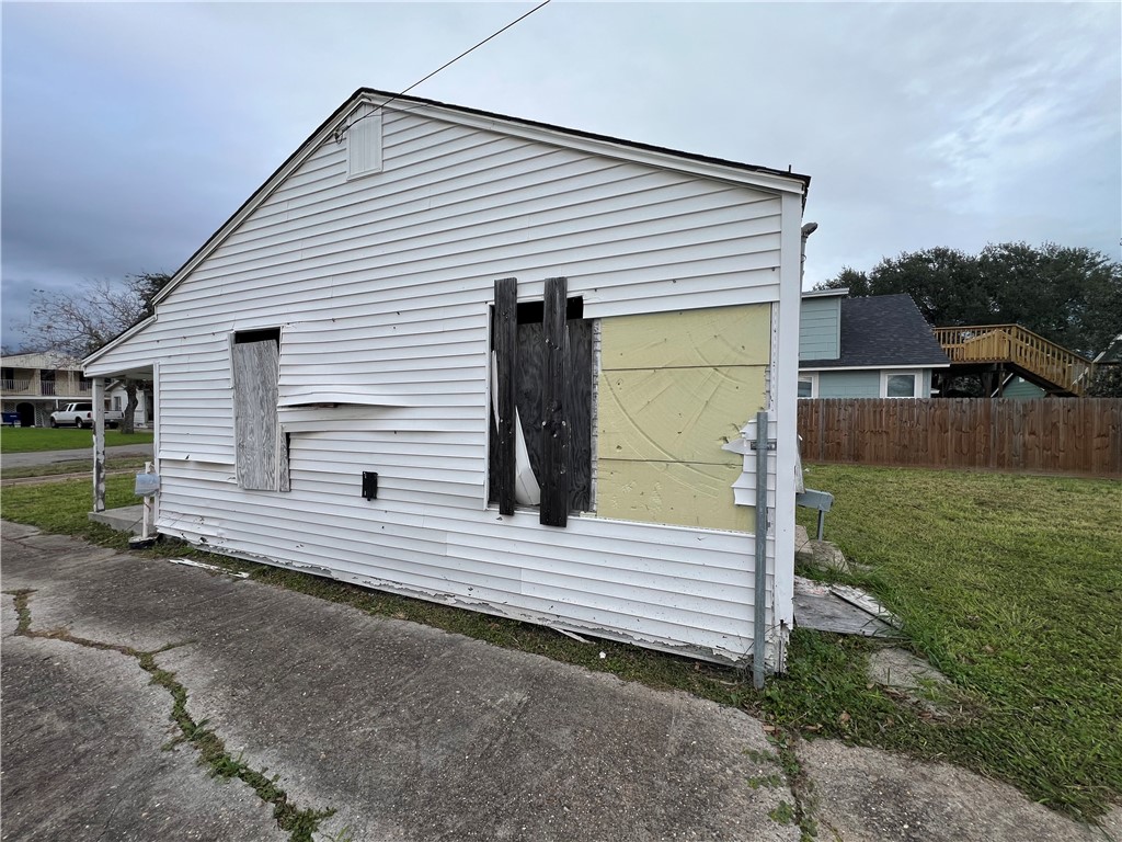 4402 Cottage Street Corpus Christi, TX 78415 - Photo 7 of 10 a view of a house with a yard
