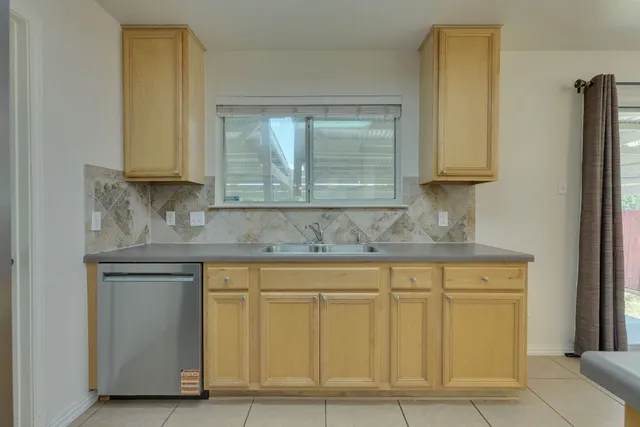 a view of storage and utility room with empty racks