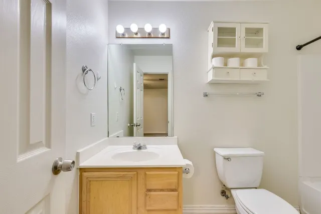 a bathroom with a shower and a bath tub