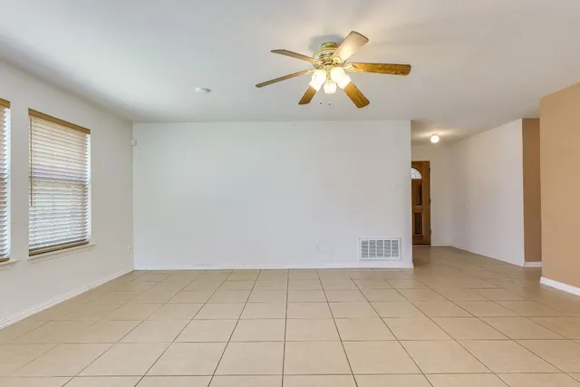 a view of a kitchen with an empty space and a kitchen view